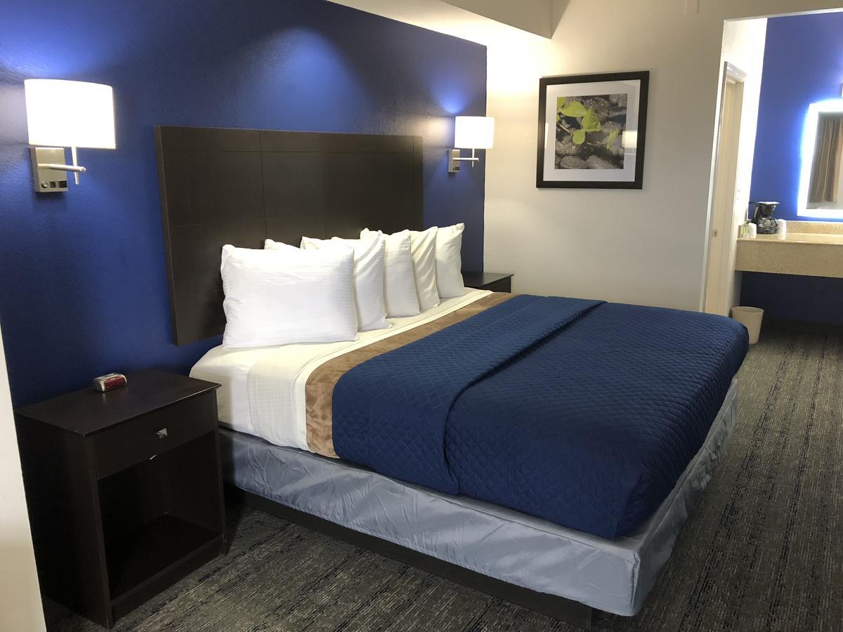 Executive Inn And Suites Joaquin Екстер'єр фото