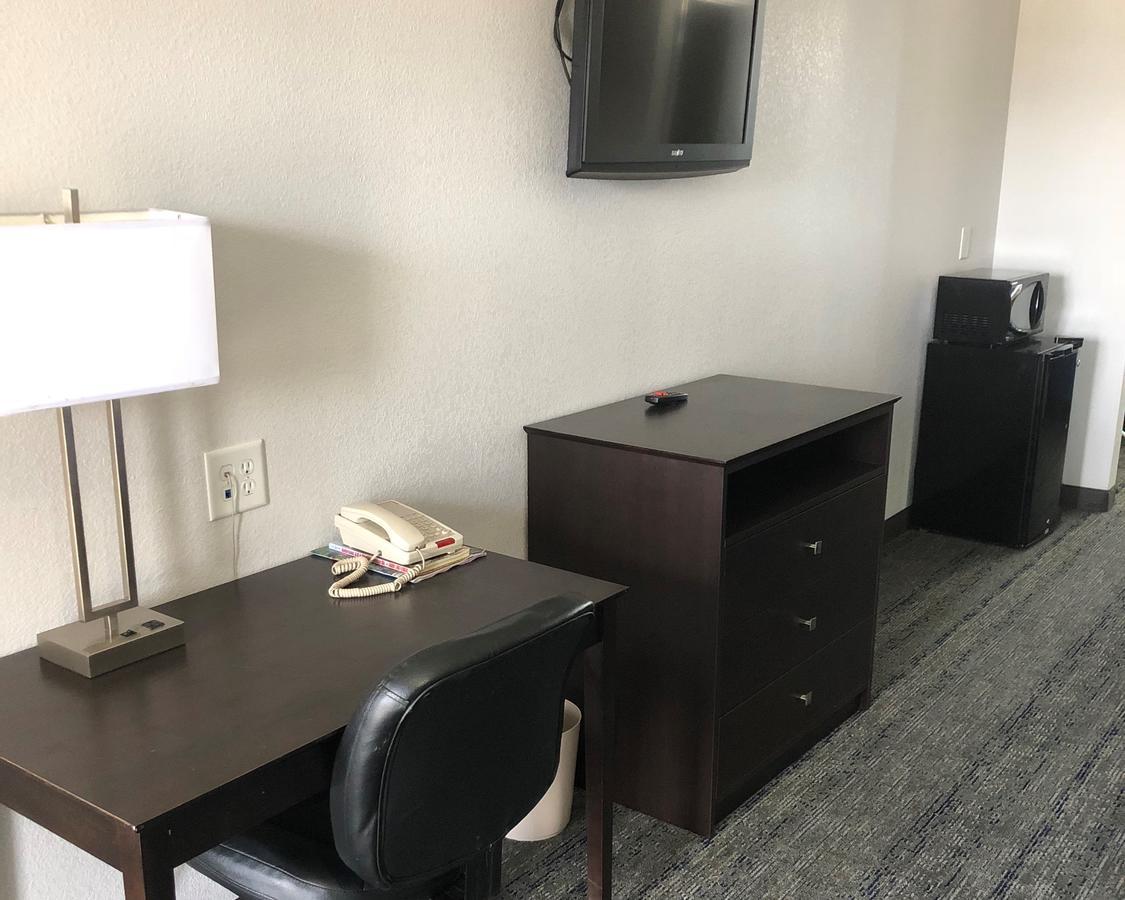 Executive Inn And Suites Joaquin Екстер'єр фото